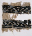 Textile from a scarf or girdle with leaves and chevrons