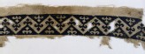 Textile fragment with band of chevrons and trefoil finials
