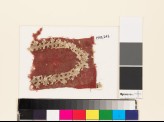 Textile fragment with shield-shape of linked crosses (EA1993.242)