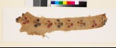 Textile fragment with stylized floral shapes