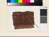 Textile fragment with large and small diamond-shapes