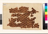 Textile fragment with stylized birds