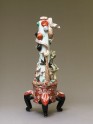 Tripod candlestick with tiger and dragon