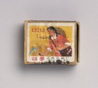 Matchbox depicting a woman holding a sickle