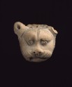 Lion mask from a vase