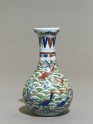 Wucai ware vase with fish amid waves