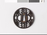 Round tsuba with karigane, or flying geese, and chrysanthemums