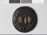 Tsuba with skull and New Year decorations