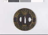 Round tsuba with half-wheels and bamboo leaves