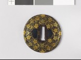Round tsuba with karakusa, or scrolling floral pattern (EAX.10161)