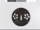 Round tsuba with heraldic mon and scrolls
