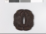 Tsuba with feather fans and gold eyelets