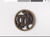 Tsuba with horse and key pattern