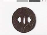 Oval tsuba with banana tree and dewdrops