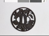 Round tsuba with clematis vine and dewdrops