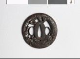 Tsuba in the form of a coiled dragon