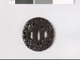 Tsuba in the form of overlapping sea shells