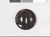 Round tsuba with chrysanthemum flower and leaves
