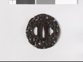 Round tsuba with cherry blossoms and leaves