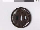 Round tsuba with two mushrooms and knotted grass