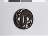 Tsuba with helmet and leaves