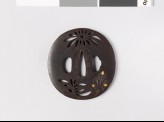 Lenticular tsuba with chrysanthemum flowers and leaves (EAX.10600)