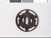 Round tsuba with triangle and flowers
