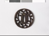 Round tsuba with grass and karigane, or flying geese