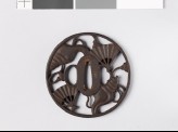 Round tsuba with conch shells and war fans