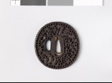 Tsuba with phoenixes amid scrollwork