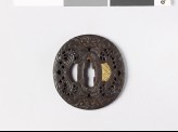 Tsuba with demon mask and scrollwork