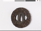 Tsuba with leaves and branching tendrils (EAX.10820)