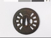 Round tsuba in the form of a wheel