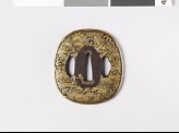 Aori-shaped tsuba with leaves and flowers