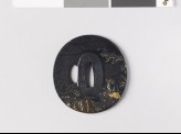 Tsuba depicting a fisherman on a beach (EAX.10986)