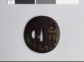 Lenticular tsuba with figures and a tiger in a landscape (EAX.11104)