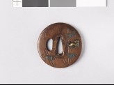 Lenticular tsuba with bamboo stems and tigers