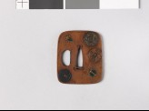 Aori-shaped tsuba depicting charms, coins, and three of the Seven Treasures (EAX.11166)