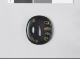 Tsuba with plants and a fan mount