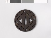 Round tsuba with L-shapes