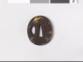 Tsuba with cherry blossom and a fūchō, or bird of paradise