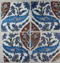 Set of four tiles with tulips, prunus sprays, and serrated leaves (EAX.3225)