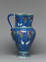 Jug with flowers against a fish-scale background (EAX.3272)