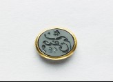 Oval bezel seal with nasta‘liq inscription, floral decoration, and bird, possibly from a pendant (EAX.3462)