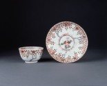 Saucer with flowers and weeping cherry trees