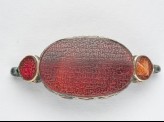 Bracelet setting with 14 oval bezel amulets and inscription