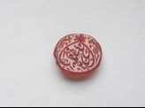 Oval bezel seal with nasta’liq inscription and floral decoration