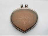 Heart-shaped bezel amulet from a pendant, inscribed with the Throne verse