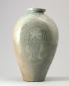 Greenware vase with birds and floral decoration