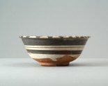 Cizhou type white ware bowl with striped decoration